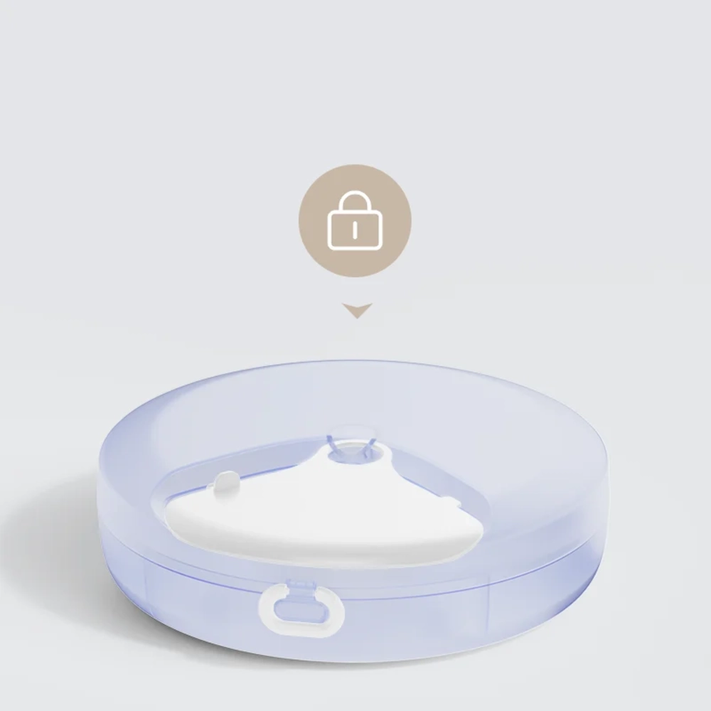 Couvercle transparent verrouillable du distributeur automatique pour chat illustrant la fonction sécurité